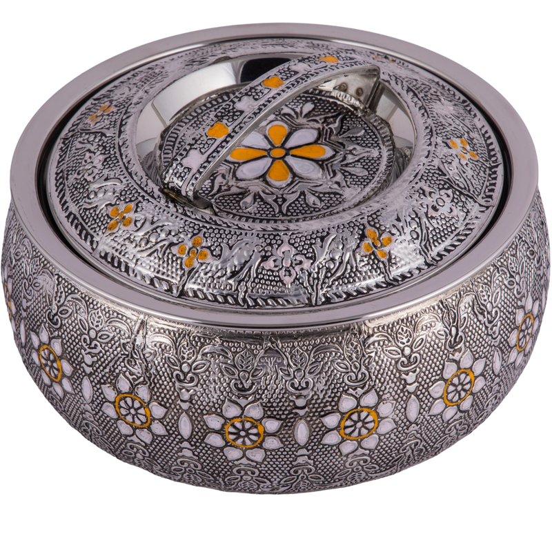 Decorative silver ring box with floral patterns on a white background